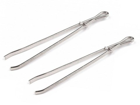 Przyrząd do przewlekania zaciskowy